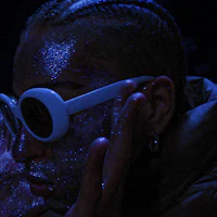 a person with glitter on his face