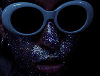 a person with glitter on their face
